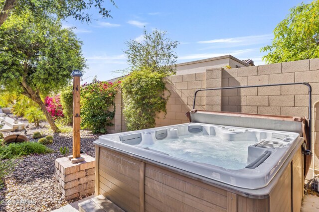 6918 E Ivyglen St, Mesa, AZ 85207 - view of patio / terrace with a hot tub