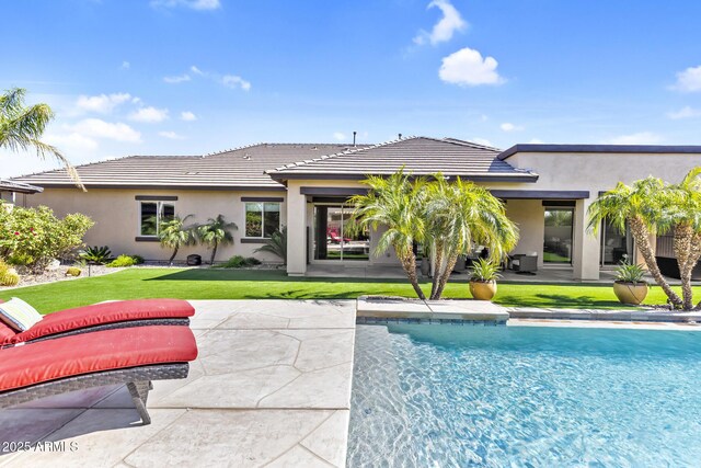 6918 E Ivyglen St, Mesa, AZ 85207 - outdoor pool featuring a yard and a patio area
