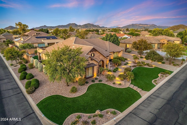 6918 E Ivyglen St, Mesa, AZ 85207 - aerial view at dusk of a residential view and a mountain view