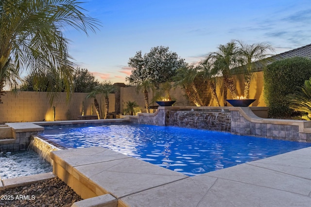 6918 E Ivyglen St, Mesa, AZ 85207 - pool at dusk with a fenced backyard