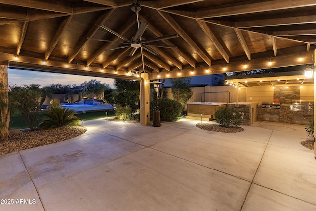 6918 E Ivyglen St, Mesa, AZ 85207 - view of patio / terrace with exterior kitchen, a ceiling fan, a gazebo, and a hot tub