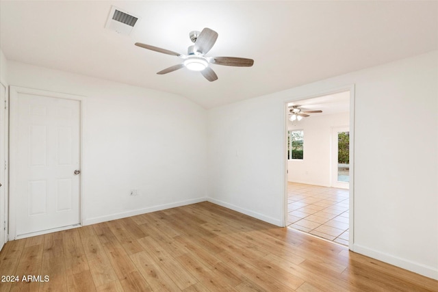 unfurnished room featuring ceiling fan and light hardwood / wood-style flooring