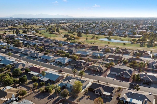 bird's eye view featuring a water and mountain view