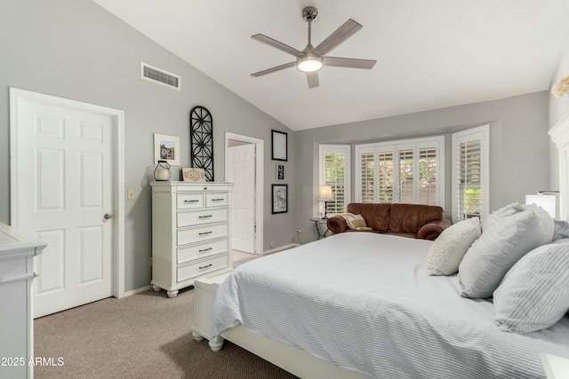 bedroom with visible vents, light carpet, baseboards, ceiling fan, and vaulted ceiling