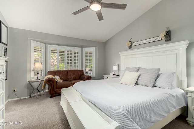 bedroom featuring carpet floors, baseboards, a ceiling fan, and lofted ceiling
