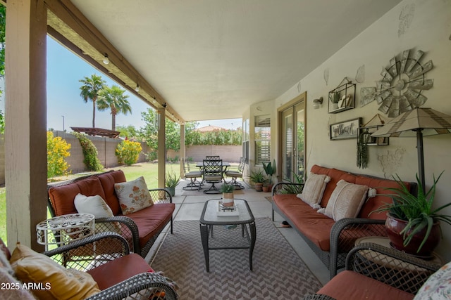 view of patio featuring a fenced backyard and outdoor lounge area