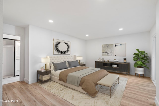 bedroom with light hardwood / wood-style flooring