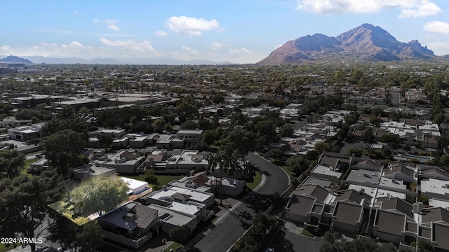 birds eye view of property featuring a mountain view