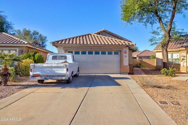 view of front of home featuring a garage