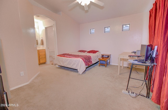 bedroom with carpet, ensuite bath, and ceiling fan