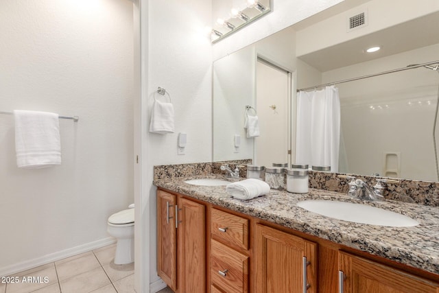 bathroom featuring a shower with curtain, vanity, tile patterned floors, and toilet