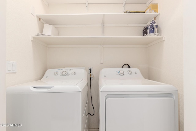 laundry room with washer and clothes dryer