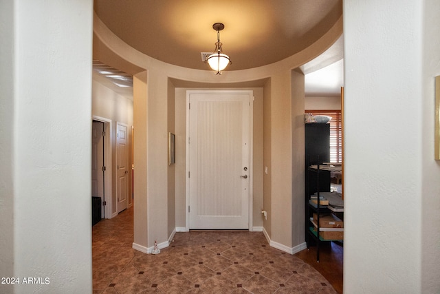 foyer featuring tile patterned flooring