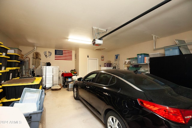 garage featuring a garage door opener