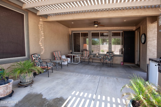 view of patio featuring a pergola and ceiling fan