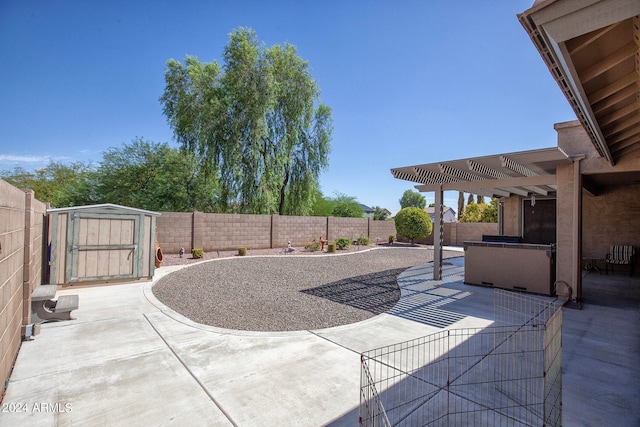 view of patio / terrace featuring a pergola and a storage shed