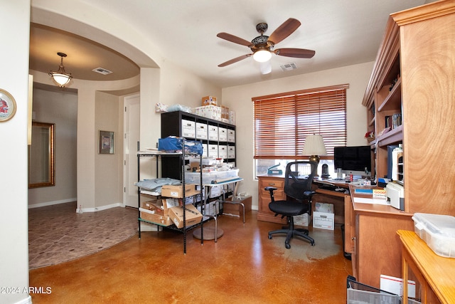 tiled office space featuring ceiling fan