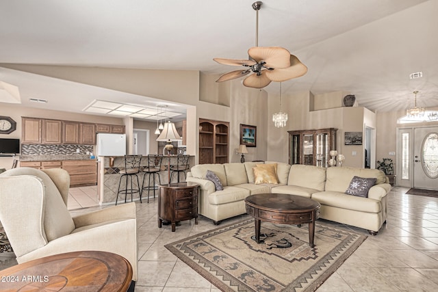 living room with light tile patterned floors, high vaulted ceiling, and ceiling fan