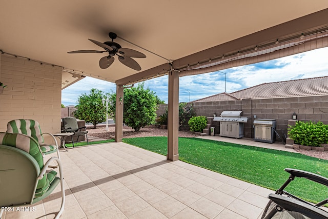 view of patio / terrace featuring ceiling fan and a grill