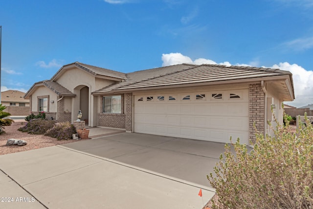 view of front of property featuring a garage