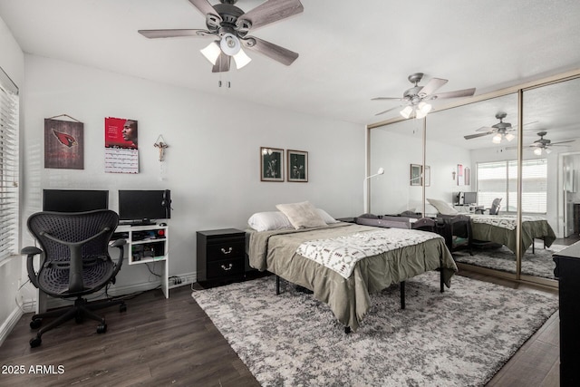 9046 N 51st Ln, Glendale, AZ 85302 - bedroom with a ceiling fan, baseboards, and dark wood finished floors