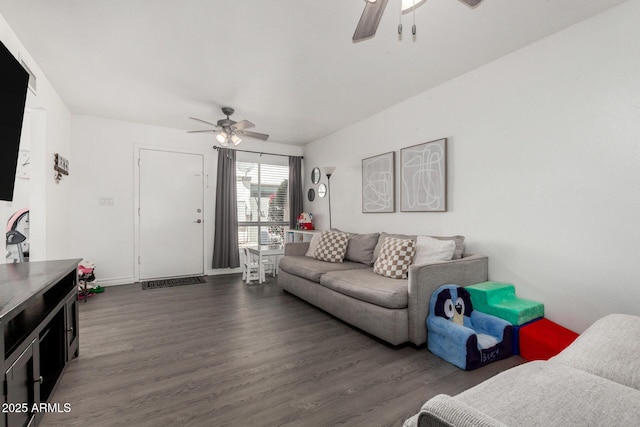 9046 N 51st Ln, Glendale, AZ 85302 - living room featuring dark wood finished floors, baseboards, and a ceiling fan