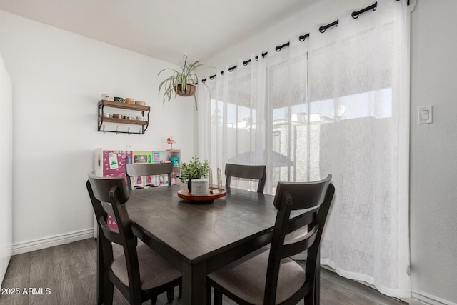 9046 N 51st Ln, Glendale, AZ 85302 - dining area with baseboards and wood finished floors