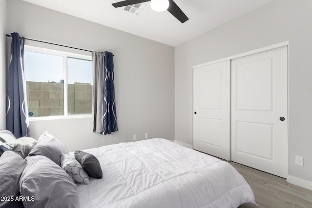 bedroom featuring a closet and ceiling fan