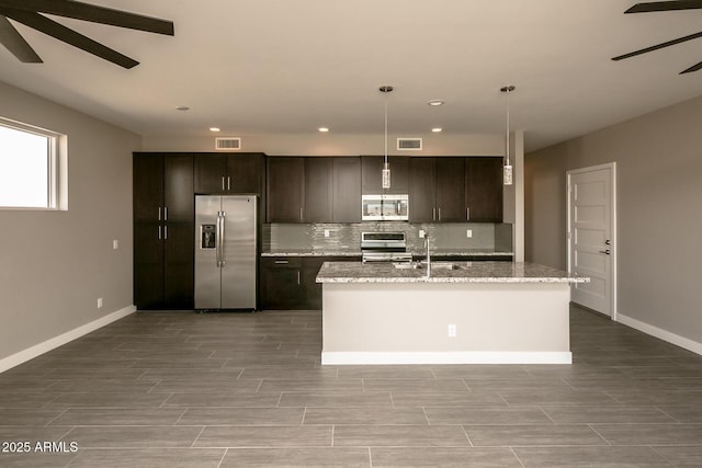 392 Schoppman Ln, Page, AZ 86040 - kitchen featuring ceiling fan, stainless steel appliances, recessed lighting, and visible vents
