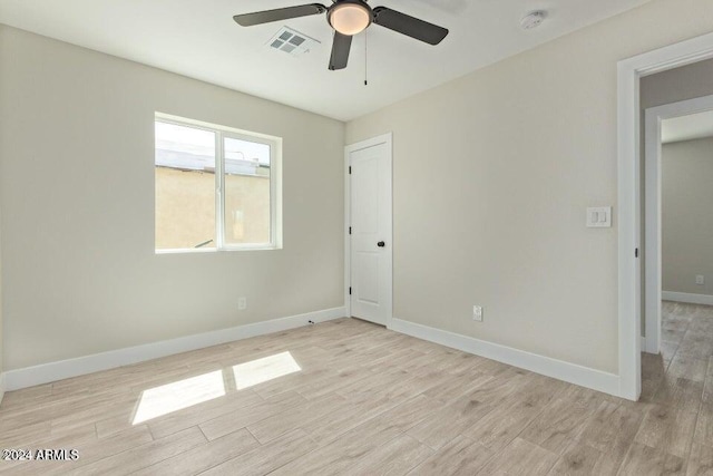 unfurnished bedroom featuring ceiling fan and light hardwood / wood-style floors