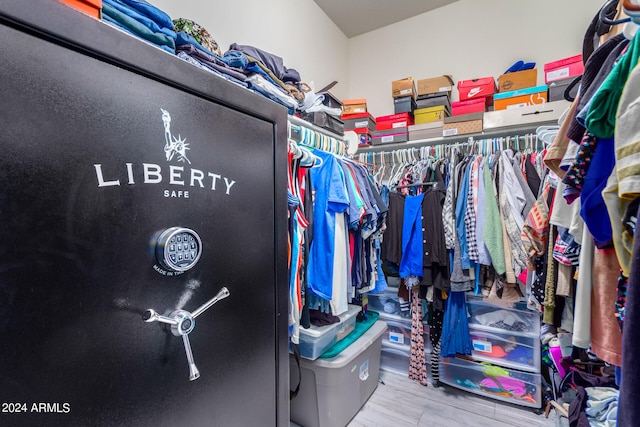 walk in closet featuring hardwood / wood-style flooring