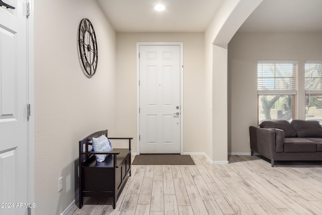 foyer entrance with light hardwood / wood-style flooring