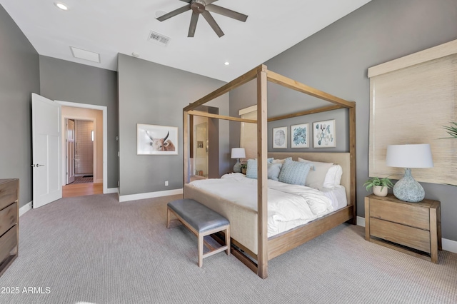 bedroom featuring light colored carpet and ceiling fan