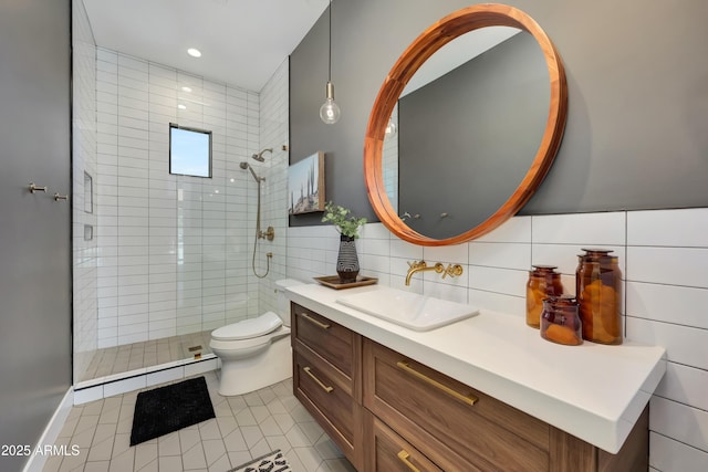 bathroom featuring a baseboard radiator, tile walls, tile patterned flooring, vanity, and toilet