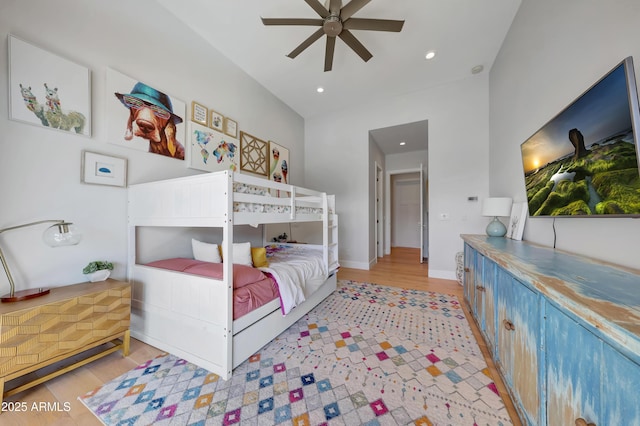 bedroom featuring ceiling fan and light hardwood / wood-style flooring