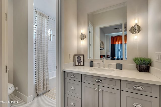 full bathroom featuring vanity, shower / tub combo, tile patterned flooring, and toilet