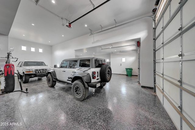 garage featuring a garage door opener