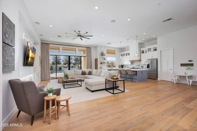 living room with light hardwood / wood-style flooring