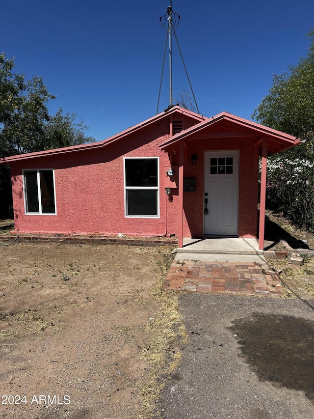 view of front of home with a patio area