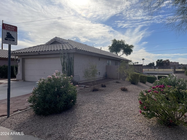 view of home's exterior with a garage