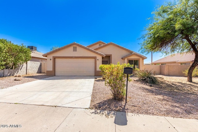 single story home featuring a garage