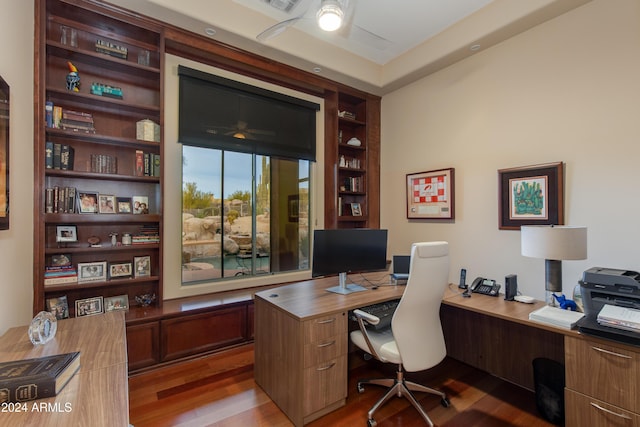 office with hardwood / wood-style floors and ceiling fan