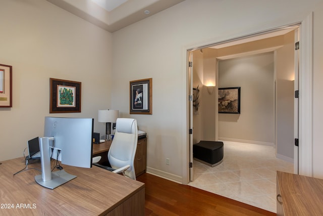 home office with light wood-type flooring