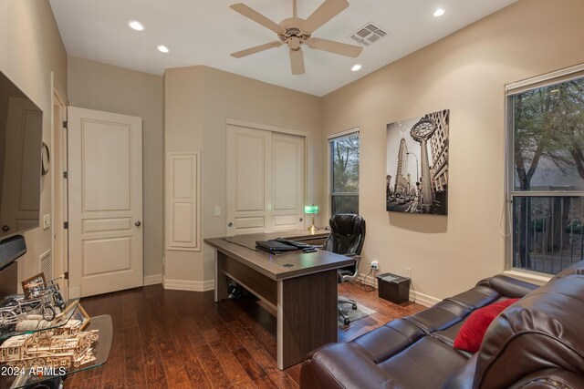 home office featuring ceiling fan and dark hardwood / wood-style floors