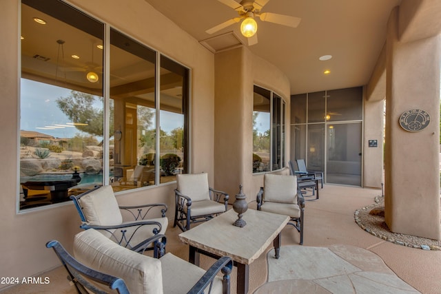 view of patio featuring ceiling fan