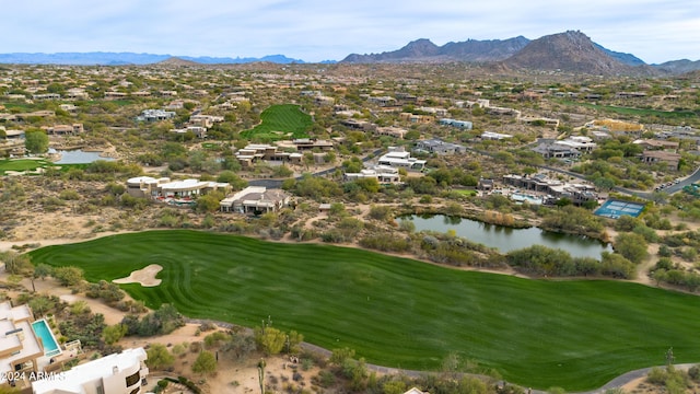 aerial view featuring a water and mountain view