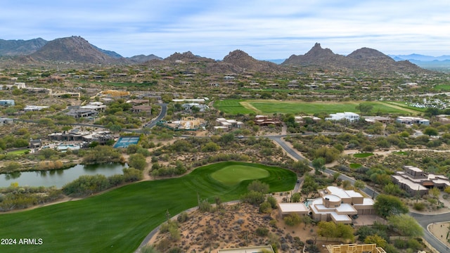 bird's eye view with a water and mountain view