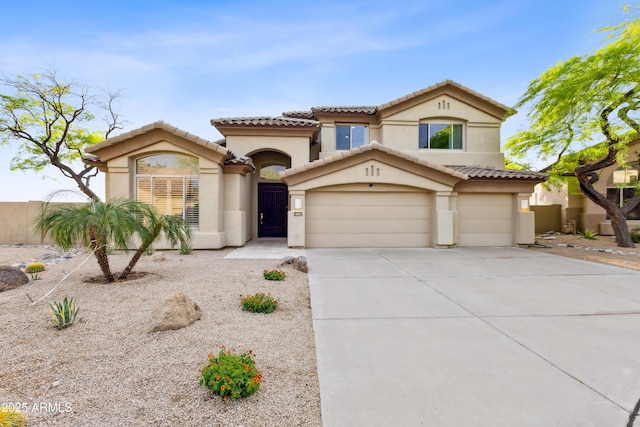 10875 E Mirasol Cir, Scottsdale, AZ 85255 - mediterranean / spanish home featuring a garage, fence, stucco siding, a tiled roof, and concrete driveway