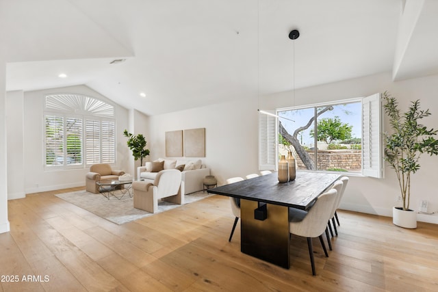 10875 E Mirasol Cir, Scottsdale, AZ 85255 - dining area featuring baseboards, vaulted ceiling, and light wood-type flooring