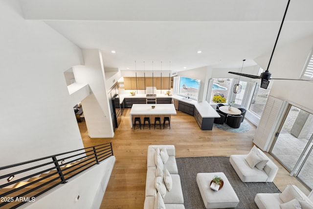 10875 E Mirasol Cir, Scottsdale, AZ 85255 - living room featuring recessed lighting and light wood-style floors